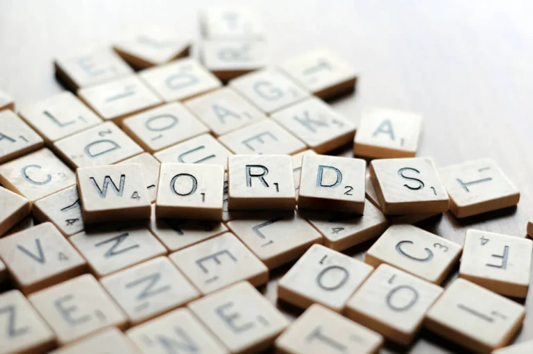scrabble letter tiles used to spell 'words'