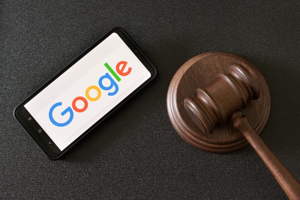 Picture of Google logo on phone and gavel