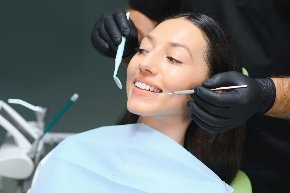 Doctor,Examining,Patient's,Teeth,,Closeup.,Cosmetic,Dentistry.